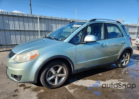 2009 Suzuki Sx4 Touring z USA, uszkodzony, nr VIN JS2YB417X96202988